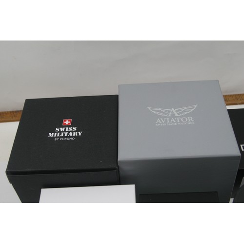 18 - Collection of vintage watch boxes from Citizen, DeTomaso, Swiss Military, Seiko, Traser and Aviator