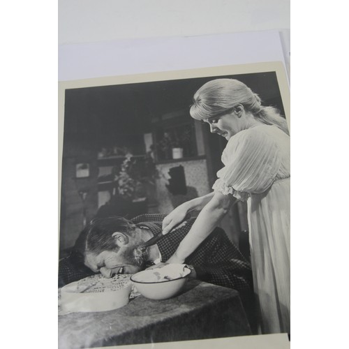 20 - Album of film lobby card photo's of John Wayne, Marx Bros, Charlie Chaplin and lots more