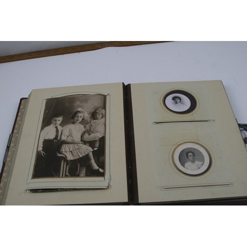 45 - Victorian photograph album with CDV and cabinet photographs