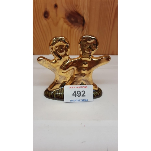 492 - WADE GOLD GINGERBREAD CHILDREN FIGURE