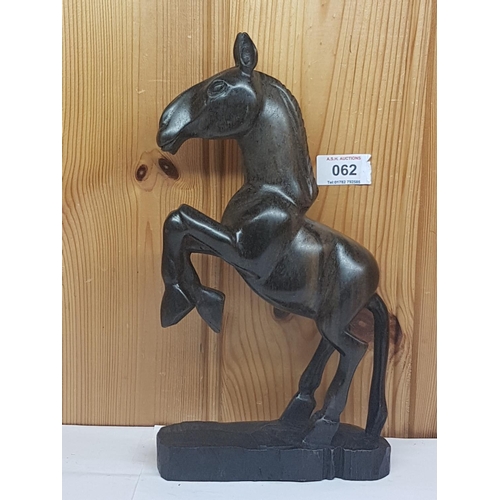 62 - MODEL OF A HORSE CARVED FROM LIGNUM VITAE