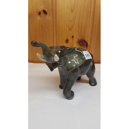 149 - POTTERY MODEL OF AN ELEPHANT (Made In England)