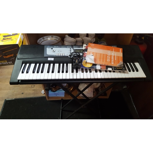 73 - YAMAHA ELECTRONIC KEYBOARD With STAND