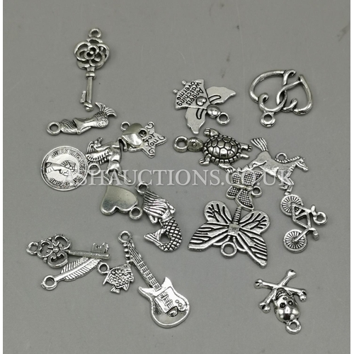 277 - PRESENTED AS SILVER CHARMS (20)