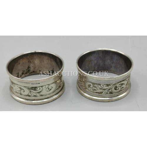 306 - PRESENTED AS A PAIR OF SILVER (Hallmarked) NAPKIN RINGS