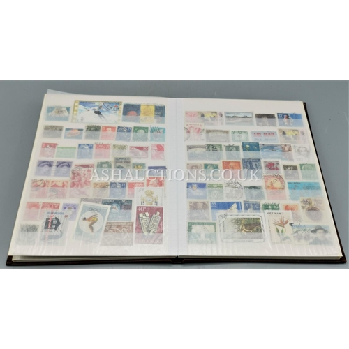 102 - STOCK BOOK WITH WORLD STAMPS