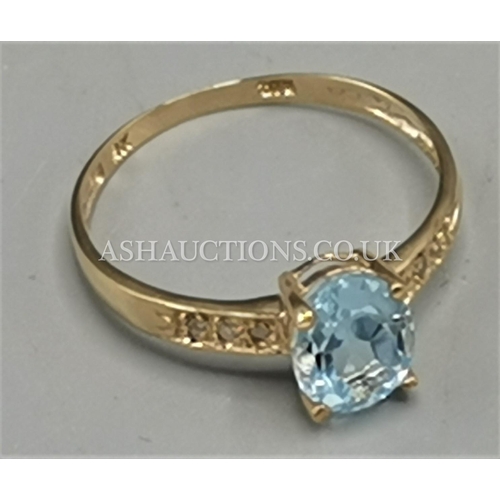 12 - PRESENTED AS A 9ct GOLD SWISS BLUE TOPAZ & DIAMOND STONE SET RING