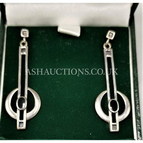 568 - PRESENTED AS A PAIR OF STERLING SILVER EARRINGS