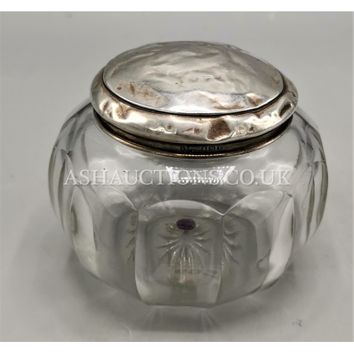 607 - PRESENTED AS A SILVER TOP GLASS JAR