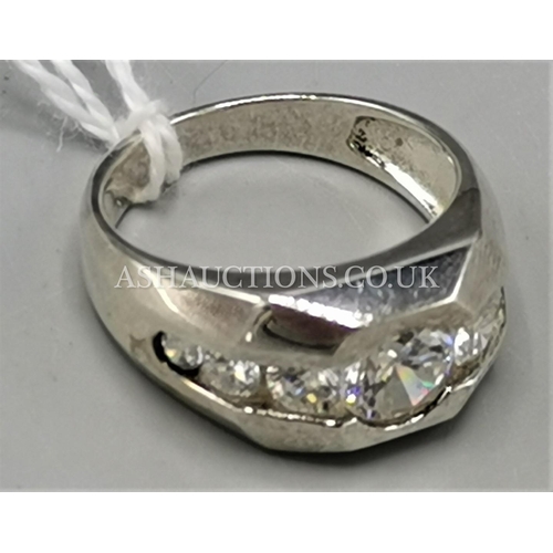 409 - PRESENTED AS A SILVER (Stamped 925) CZ STONE SET RING (Size R)