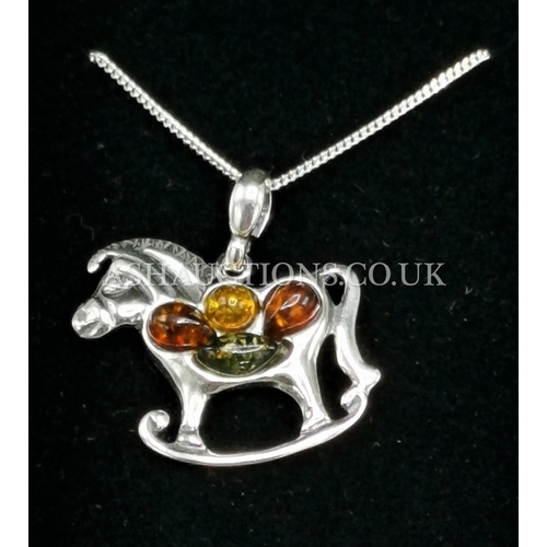 411 - PRESENTED AS A SILVER (Stamped 925) & MIXED COLOUR AMBER 'ROCKING HORSE' PENDANT On CHAIN (Boxed)