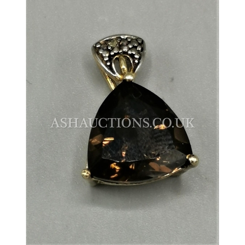 555 - PRESENTED AS A SILVER (Stamped 925) GILT STONE SET PENDANT