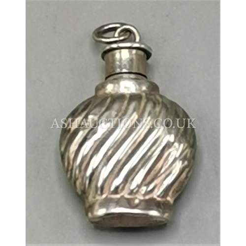 561 - PRESENTED AS A SILVER (Stamped 925) Small BOTTLE (Weight 3.4 Grams)