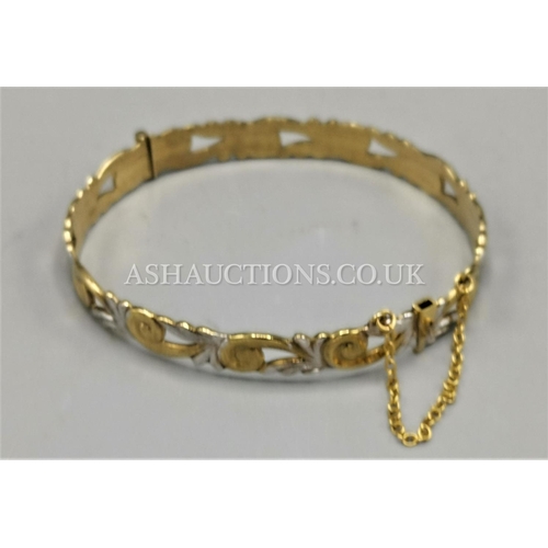 566 - PRESENTED AS A ROLLED GOLD BANGLE (Weight 11.9 Grams)