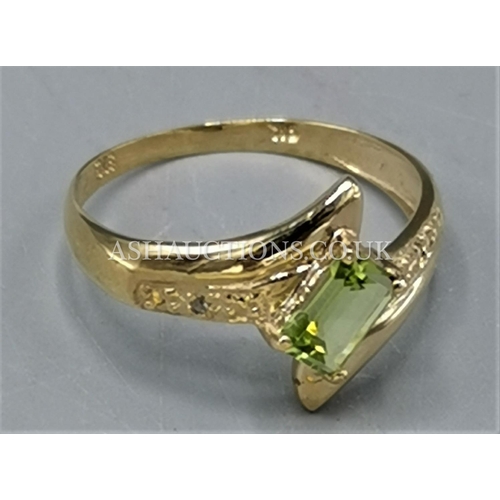 14 - PRESENTED AS A 9ct GOLD PERIDOT & DIAMOND STONE SET RING