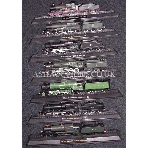 131 - ASSORTED TRAINS & WAGONS (7) ON RAIL STANDS