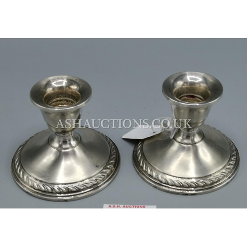 239 - PRESENTED AS A PAIR OF STERLING SILVER CANDLESTICKS By PREISNER