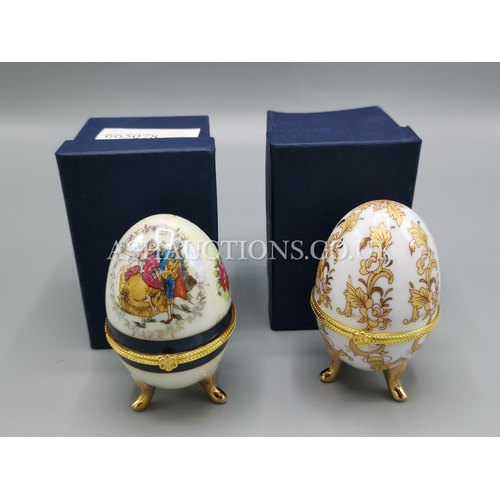 274 - OEUFS PORCELAIN DECORATIVE EGG SHAPED TRINKETS (2)  (Both Boxed)