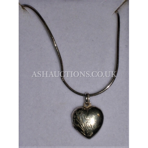 449 - PRESENTED AS A SILVER (925) HEART LOCKET ON CHAIN (Boxed)