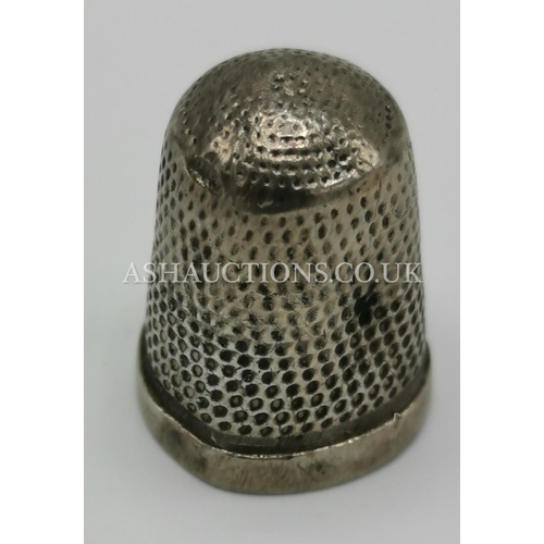 343 - PRESENTED AS A SILVER ENGLISH THIMBLE