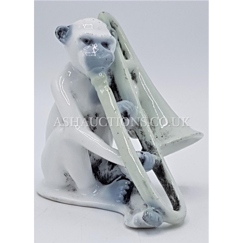 454 - ITALIAN 7.5cm DEPOSE MONKEY PLAYING AN INSTRUMENT