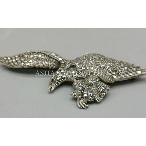 898 - PRESENTED AS A SILVER MARCASITE BROOCH IN THE FORM OF AN EAGLE With RUBY EYE. (Full Birmingham Hallm... 