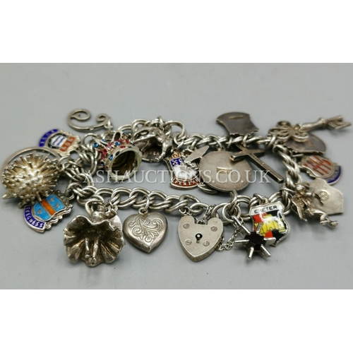 901 - PRESENTED AS A SILVER CHARM BRACELET (Birmingham Hallmarks) With PADLOCK & SAFETY CHAIN And 23 CHARM... 