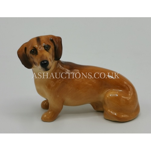 64 - ROYAL DOULTON 7cm MODEL OF A DACHSHUND K17 (Model No 1096) 1940/77 Designer Unknown.
(Charlton Royal... 