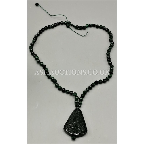 112 - PRESENTED AS A DARK JADE LARGE FAN PENDANT & BEADED CHAIN. Weight 85.8 Gram. Length Of Cord 60cm - 8... 