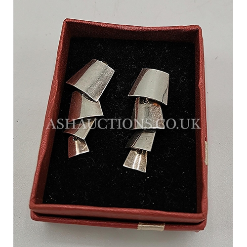 989 - PRESENTED AS A PAIR OF SILVER DESIGNER EARRINGS (Boxed)