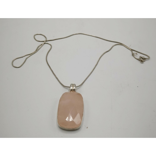 1203 - PRESENTED AS A SILVER (925) ROSE QUARTZ PENDANT On A SILVER (925) NECK CHAIN (Weight 17.2 Grams)