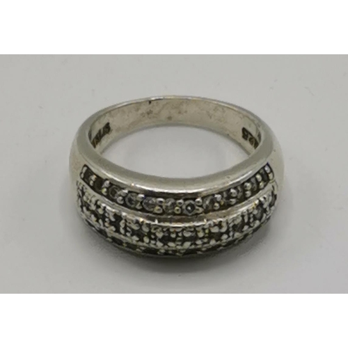 1207 - PRESENTED AS A SILVER (925) RING WITH 36 CLEAR STONES (Weight 6 Grams)