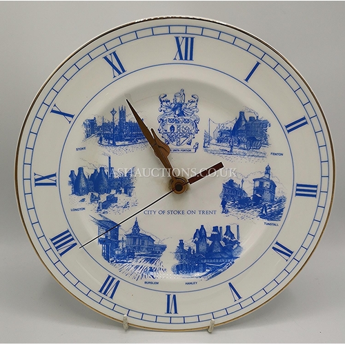 506 - CERAMIC CLOCK 27cm Dia. (Depicting The Six Towns Of Stoke On Trent.)