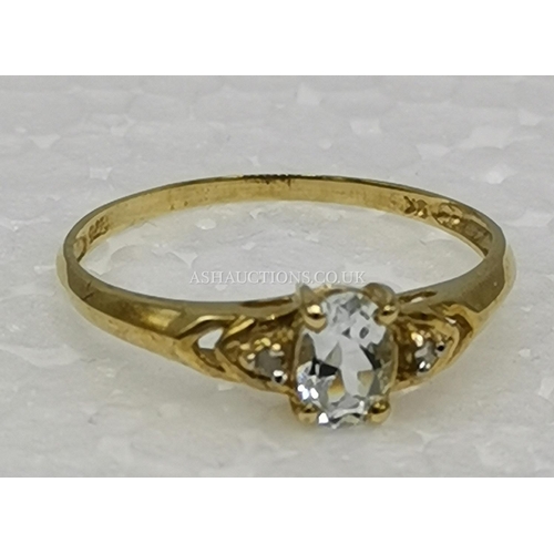 509 - PRESENTED AS A 9ct GOLD / OVAL NATURAL AQUAMARINE & DIAMOND STONE SET RING (Size O-P,Weight__1.1Gram... 