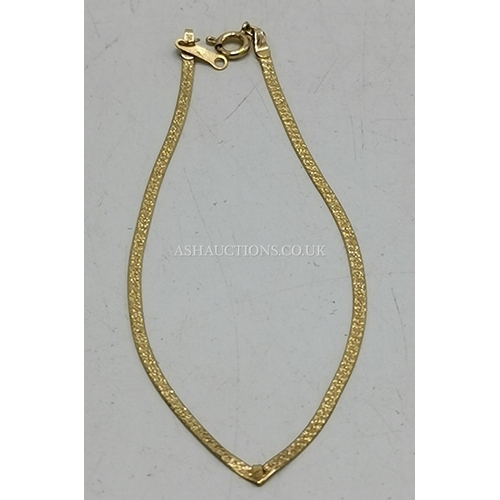 1073 - PRESENTED AS A 9ct GOLD (375) 16cm BRACELET  (Weight 0.9 Grams)