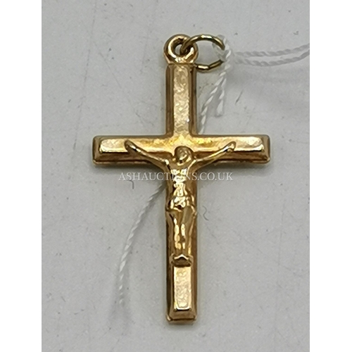 1075 - PRESENTED AS A 9ct GOLD (375) CRUCIFIX (Weight 0.4 Grams)