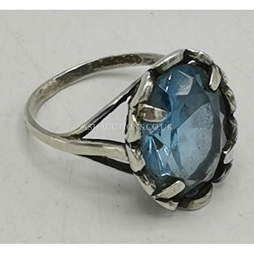 1216 - PRESENTED AS A SILVER (Hallmarked) AQUA STONE SET RING (Size R , Weight 6.2 Grams)