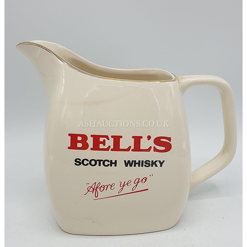 496 - WADE PDM BELLS SCOTCH WHISKY JUG 14cm, 