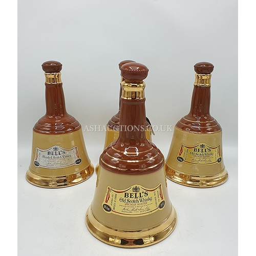 554 - WADE BELLS DECANTERS (4)