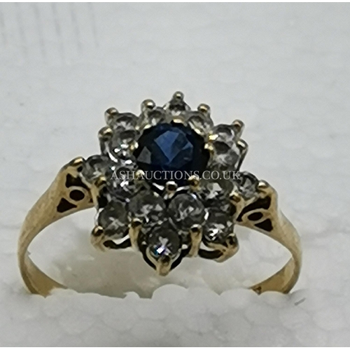 909 - PRESENTED AS A 9ct GOLD (Hallmarked) SAPPHIRE & WHITE STONE SET RING (Size___K-L____l Weight   2.11 ... 