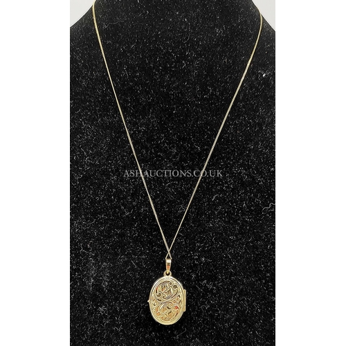 940 - PRESENTED AS A 9ct GOLD LOCKET On 9ct GOLD CHAIN  (Weight_______)