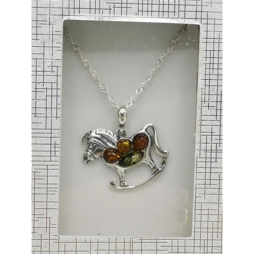 1174 - PRESENTED AS A SILVER (925) /BALTIC AMBER ROCKING HORSE PENDANT On SILVER CHAIN  (Boxed)