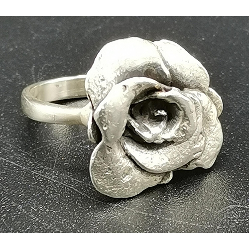 130A - PRESENTED AS A SILVER ROSE RING (Size N ,Total Weight 12.1 Grams)