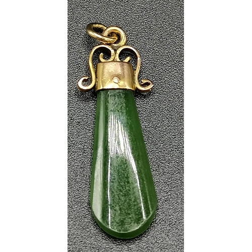 140A - PRESENTED AS A 9ct GOLD JADE ? PENDANT  (Total Weight 2.0 Grams)