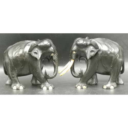 160 - EBONY MODELS OF TWO SRI LANKAN ELEPHANTS (One Has Tusks Missing)