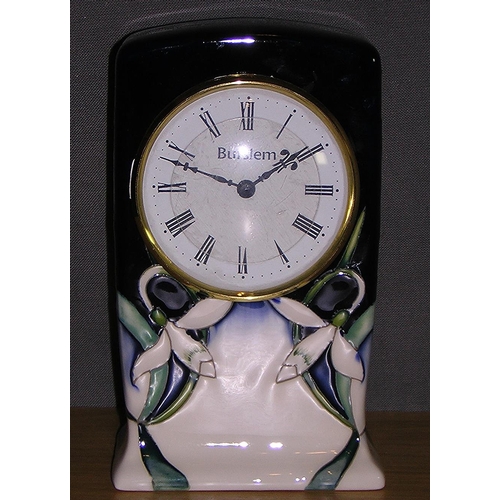 406 - MOORCROFT MANTLE CLOCK IN THE SNOWDROP DESIGN