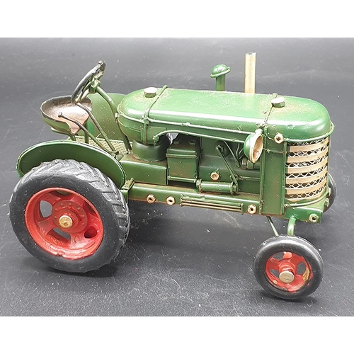 539 - TIN PLATE MODEL OF A TRACTOR (10cm x 17cm )