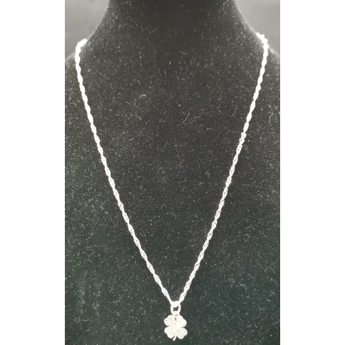 561 - PRESENTED AS A SILVER (Stamped 925) CLOVER LEAF PENDANT ON A 40cm NECK CHAIN  (Total Weight 2.2 Gram... 