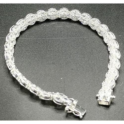 563 - PRESENTED AS A SILVER (Stamped 925) & MARQUISE CRYSTAL 19cm BRACELET  (Total Weight 12.9 Grams) (Box... 