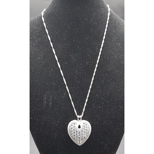 597 - PRESENTED AS A SILVER (Hallmarked) /AQUAMARINE STONE SET HEART SHAPED PENDANT  (Weight_______)